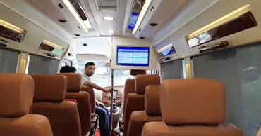 char dham yatra by 12 seater deluxe 1x1 tempo traveller