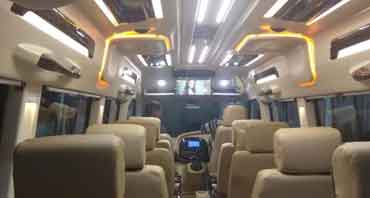 char dham yatra by 11 seater deluxe 1x1 tempo traveller
